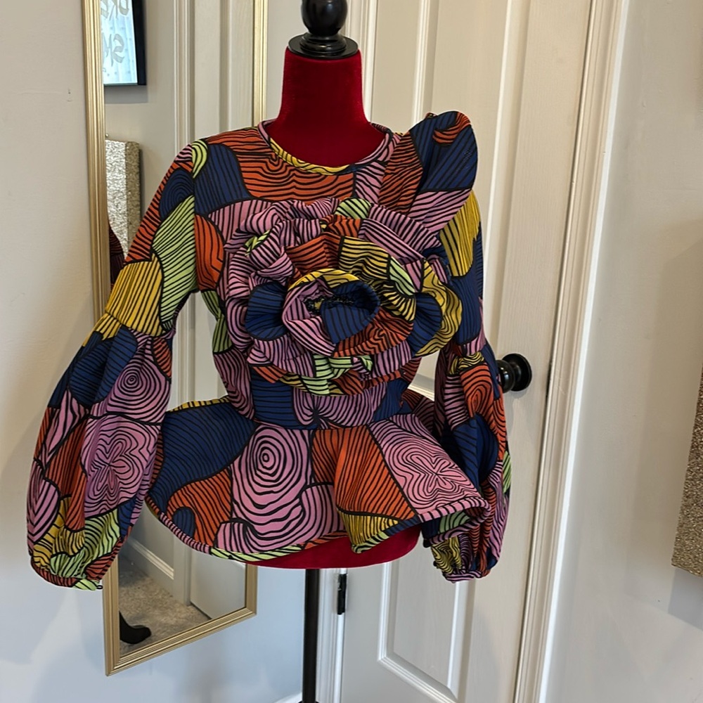 Eccentric Peplum Top